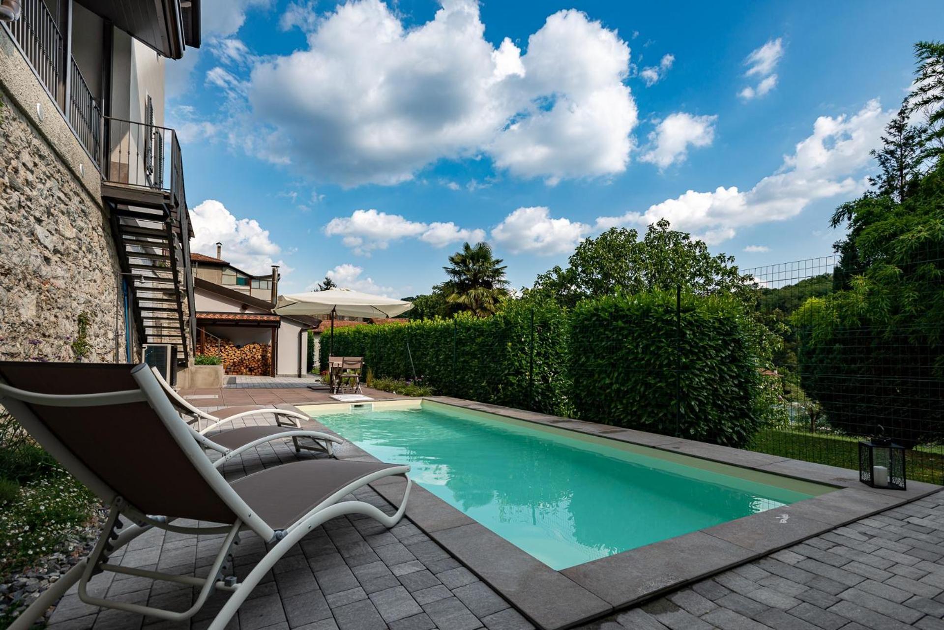 Mg House Luxury Apartment โกโม ภายนอก รูปภาพ